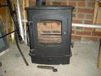 Multi fuel stove Charnwood cove multi fuel stove, 2 years....